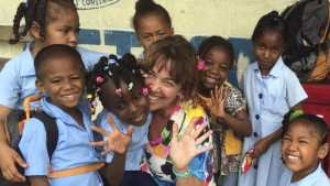 Giving Back - Elizabeth with the children of Zion Park School in Belize